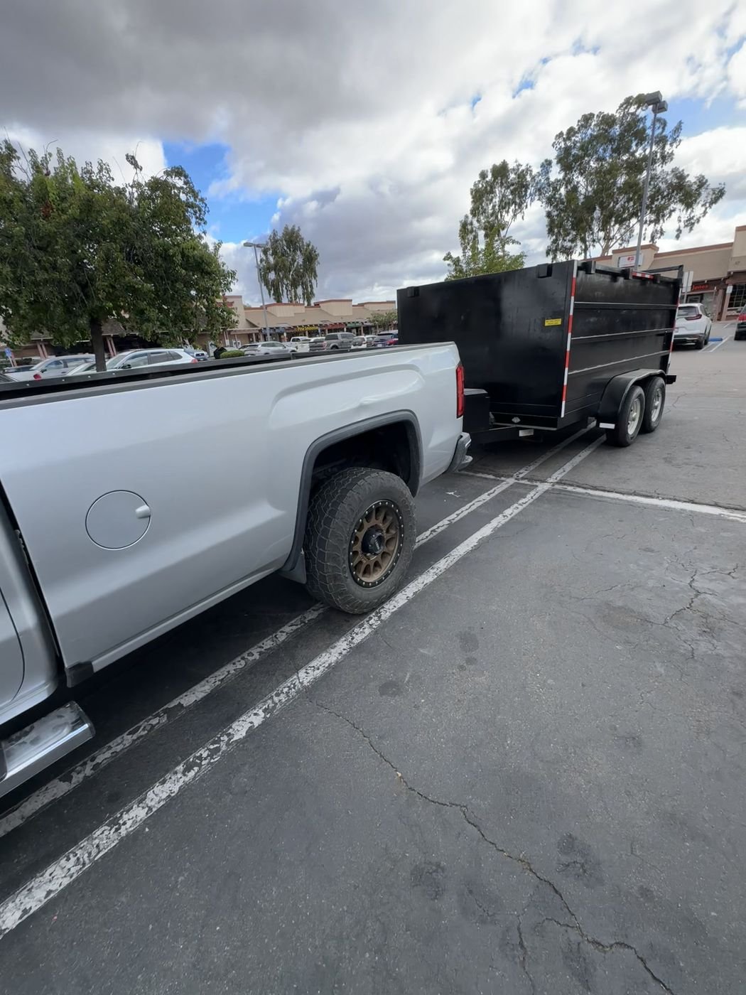North County Cleanouts truck and dump trailer